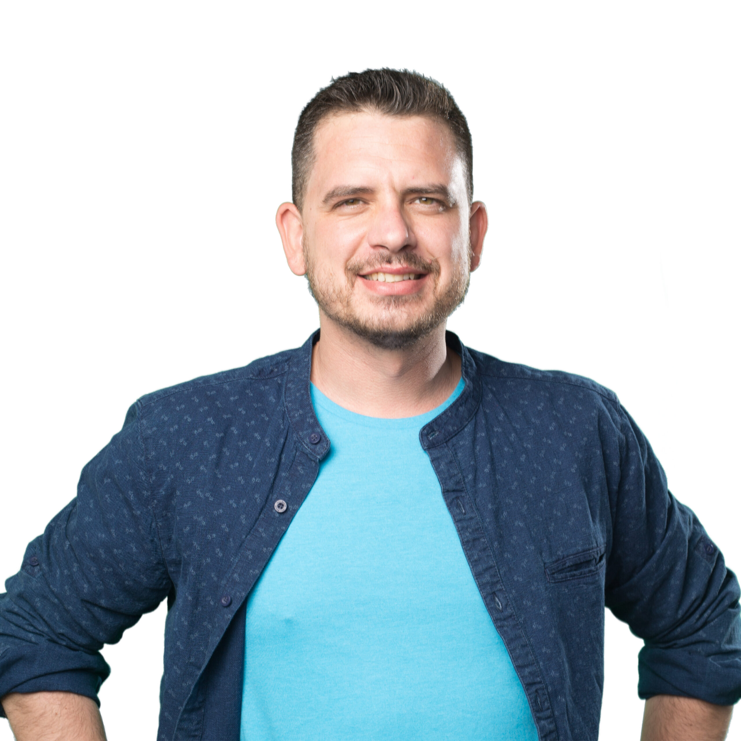 young man wearing blue outfit looking confident scaled سام صنعت امروز